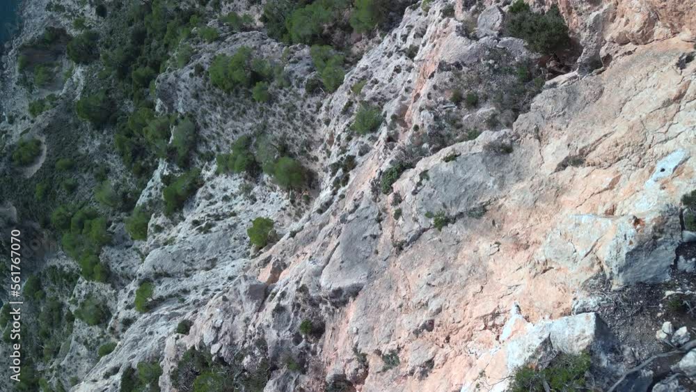 Dangerous abyss precipice. Spectacular aerial view flight vertical bird's eye view drone
edge cliff hike on island ibiza, autumn 2022. High Quality 4k Cinematic footage Dangerous abyss precipice. Spectacular aerial view flight vertical bird's eye view drone
edge cliff hike on island ibiza, autumn 2022. High Quality 4k Cinematic footage