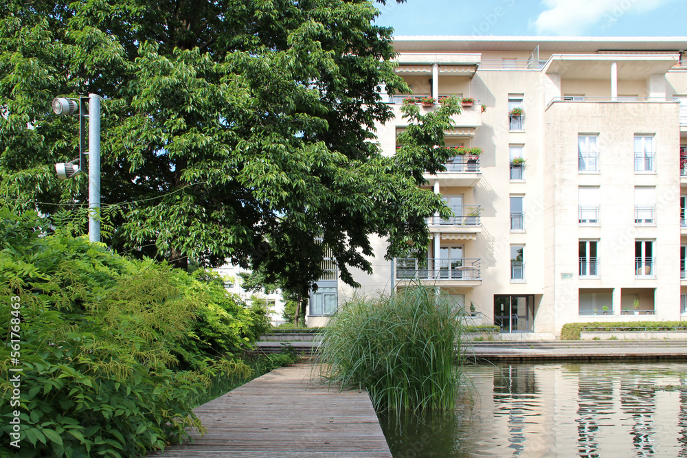 pond and modern flat building in nancy (france)