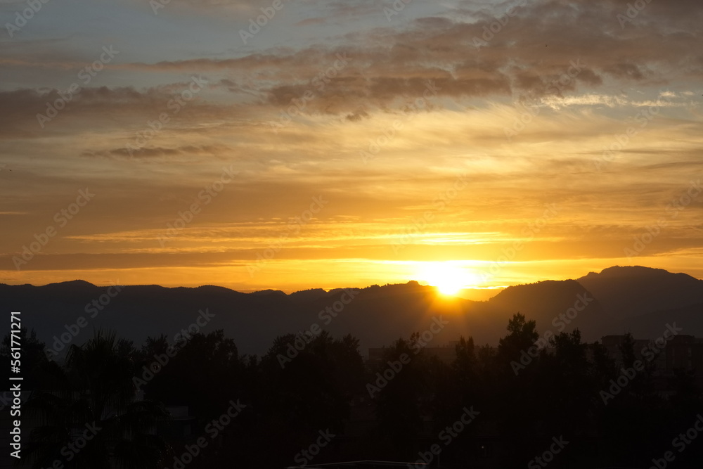 Fototapeta premium Spectacular and colorful sunrise on the horizon in Murcia 