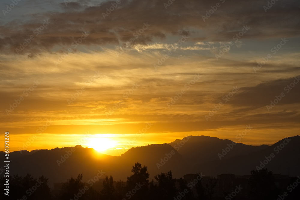 Fototapeta premium Spectacular and colorful sunrise on the horizon in Murcia 