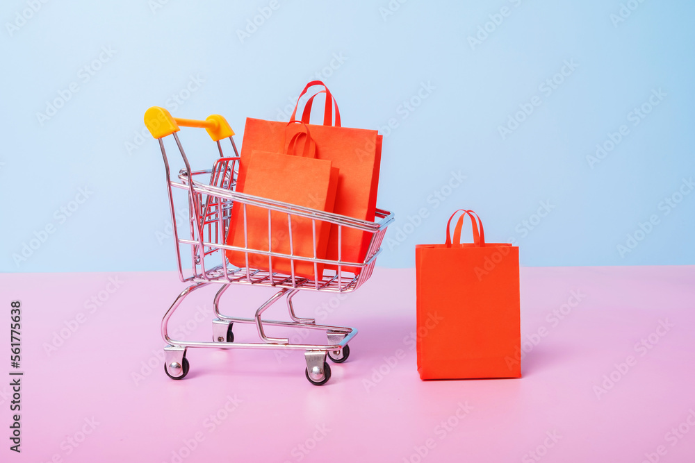 Valentines day sale shopping concept. Dall with shopping bags