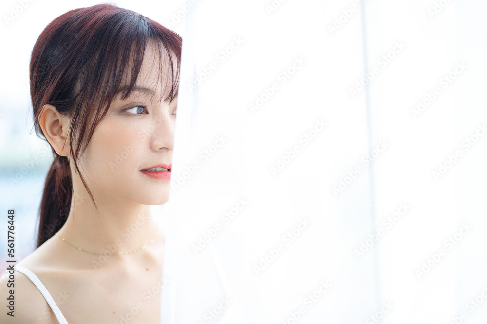 Beauty image of young Asian woman at home in the morning Beauty image of young Asian woman at home in the morning