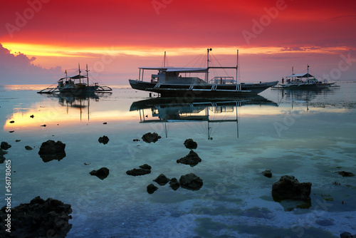 Traditional outrigger fishing boats, MalapascuaÂ Island, Cebu Province, CentralÂ Visayas, Philippines photo