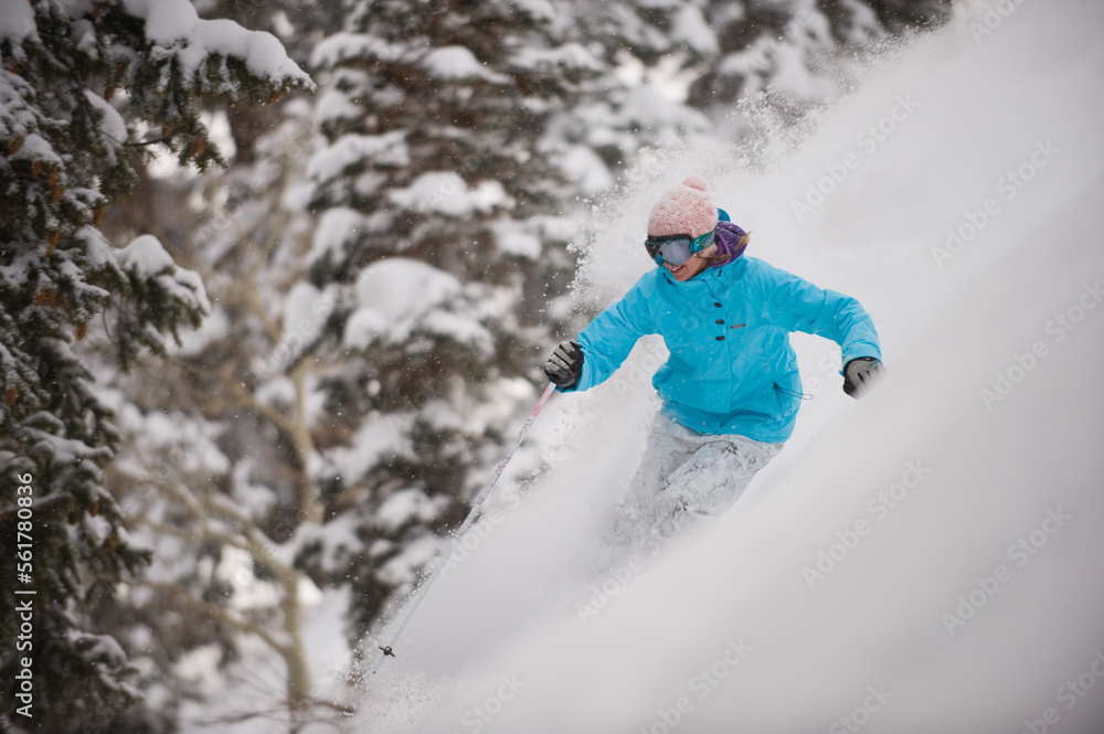 Woman skiing powder, Park City, Utah. Woman skiing powder, Park City, Utah.