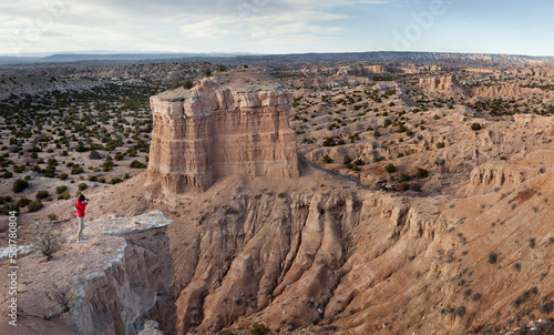 A woman makes a photograph of a New Mexico landscape photo