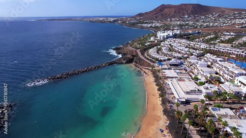 Lanzarote island, popular beach Flamingo in Playa Blanca resort. aerial drone video. Canary islands of Spain photo