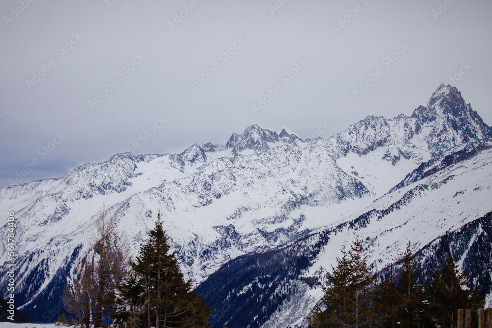 Magnificent view of ridge of European Alps in winter, ski resort Chamonix Mont-Blanc, France. Ideal place for extreme sport and hiking. Winter activity. Natural background