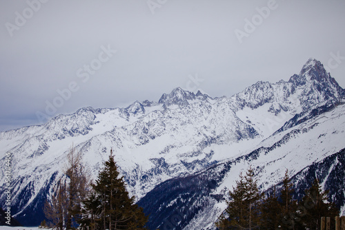 Magnificent view of ridge of European Alps in winter, ski resort Chamonix Mont-Blanc, France. Ideal place for extreme sport and hiking. Winter activity. Natural background