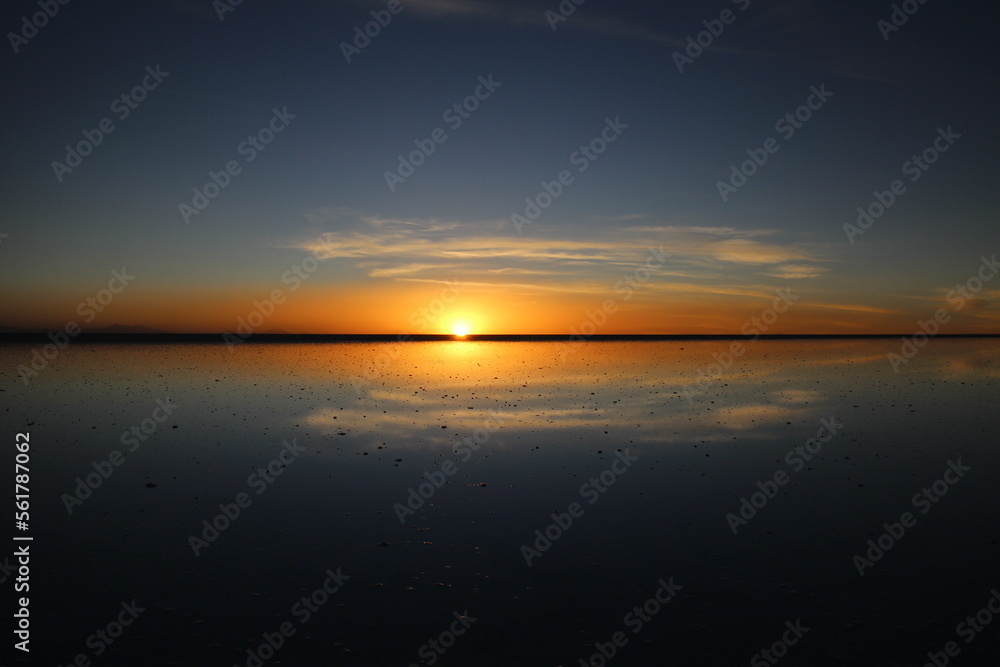Sunset over Uyuni salt lake in Bolivia