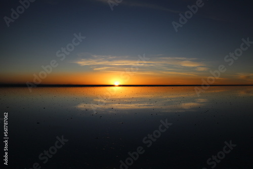 Sunset over Uyuni salt lake in Bolivia