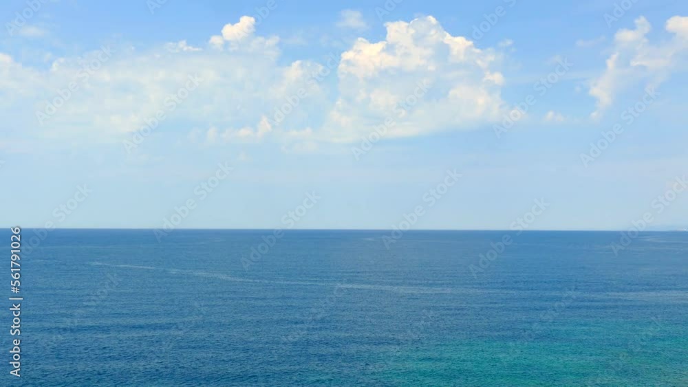 Aerial view of beautiful clear blue sea and boat with clouds on sky, Adriatic sea in Montenegro, time lapse Aerial view of beautiful clear blue sea and boat with clouds on sky, Adriatic sea in Montenegro, time lapse