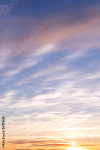 Sunset sky with light white clouds