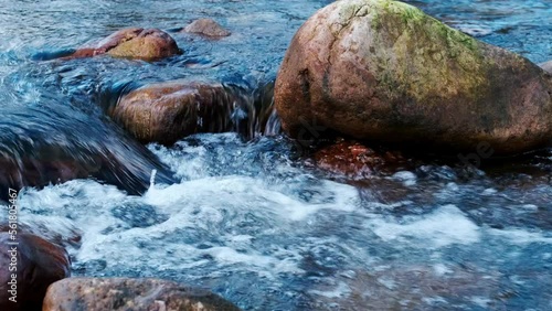 slow-motion water in a mountain stream photo