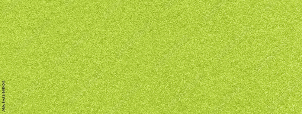 Texture of old bright green color paper background, macro. Structure of a vintage craft olive cardboard. Texture of old bright green color paper background, macro. Structure of a vintage craft olive cardboard.