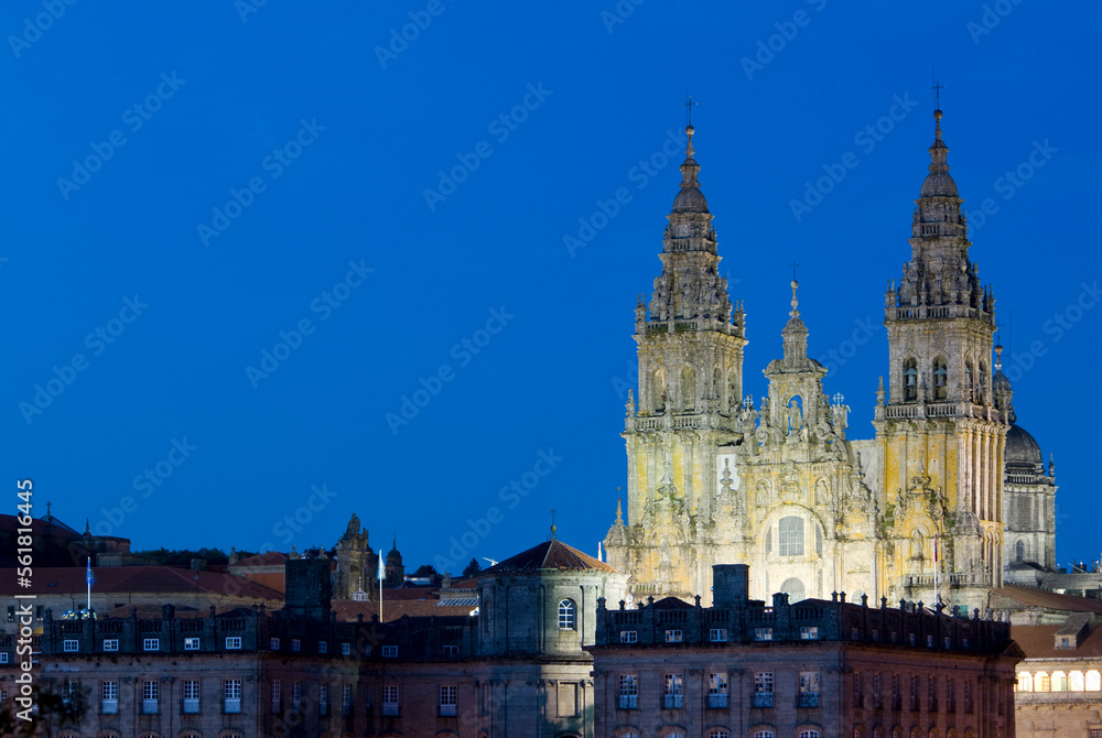 Naklejka premium Night scene, Skyline of Santiage de Compostela with lit cathedral,