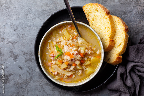 Tableau sur toile South Tyrolean barley soup Gerstsuppe, Graupensuppe, made with smoked pancetta or bacon, calery, fennel, potato, onion