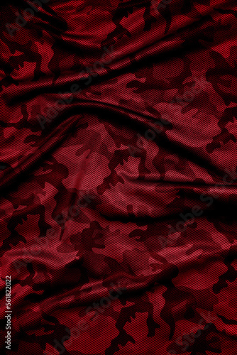 Camouflage pattern. Trendy dark red camouflage fabric. Military texture. Dark back.