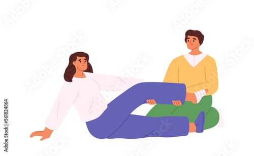 Man putting bandage on female foot after injury, strain or broken leg trauma accident