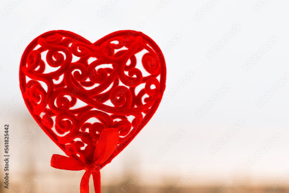 Decorative red heart for valentine's day on a white background.