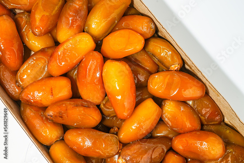 Fresh ripe yellow dates, fresh dates ruthob isolated on white background photo