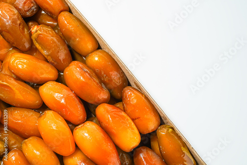 Fresh ripe yellow dates, fresh dates ruthob isolated on white background photo