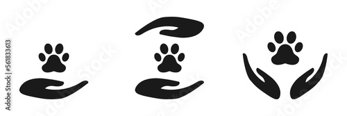 The hand holds the paw symbol. Icon set