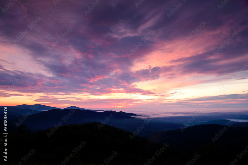 Sunrise in the Great Northwest. Purple skies over mountains at Olympic National Park, Washington, USA.