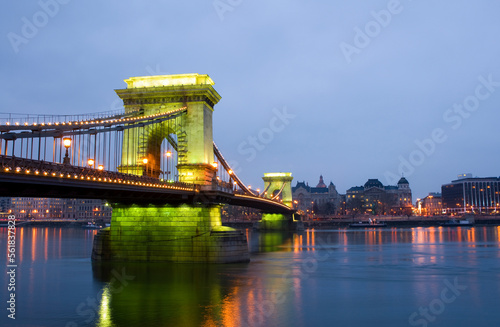The chain bridge  Budapest  looking towards Pest  Let evening  with lights reflected in the Danube.