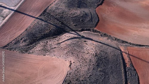 wind turbine and its shadow on the earth