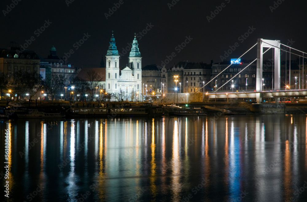 The inner city parish church and Elizabeth Bridge in Budapest at night