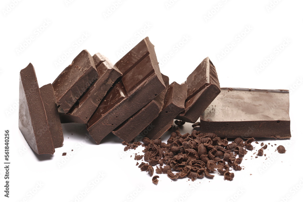 Fototapeta premium Chopped, milled dark chocolate pile with shavings isolated on white, side view