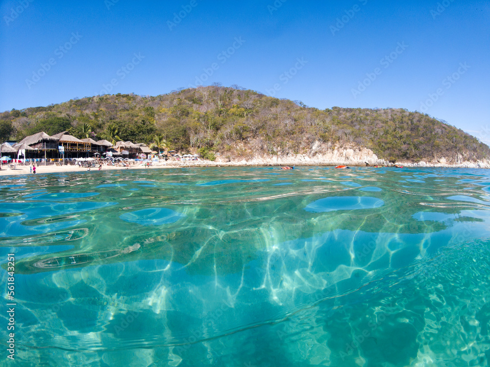 Abstract tropical sea watershed design with underwater water and sky. Huatulco bay. Oaxaca, Mexico