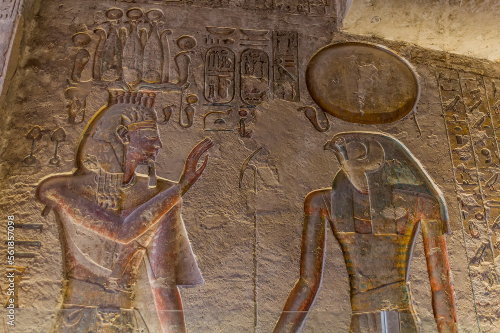 LUXOR, EGYPT - FEB 20, 2019: The pharaoh is welcomed to the afterlife by the god Horus. Ramesses III tomb at the Valley of the Kings at the Theban Necropolis, Egypt