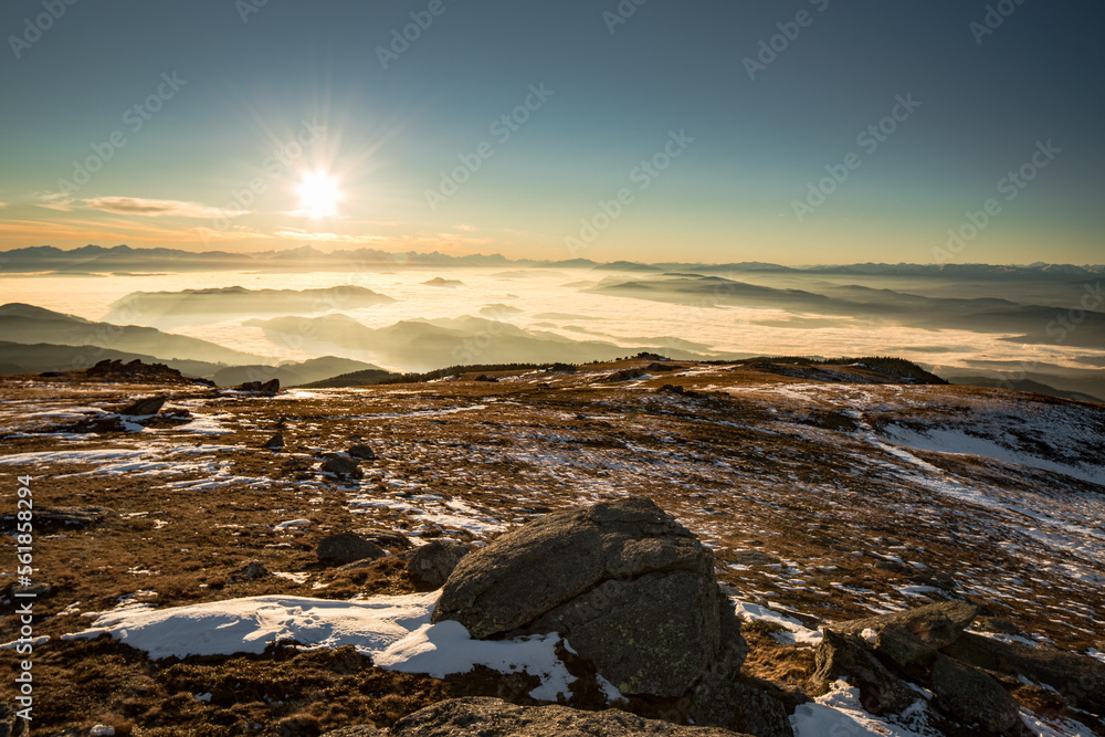 sunset seen from Saualm looking over carinthia with the most southern mountains of austria in the background. sunset seen from Saualm looking over carinthia with the most southern mountains of austria in the background.