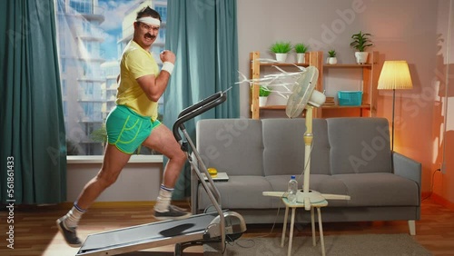 funny athlete with a mustache running treadmill in the living room
