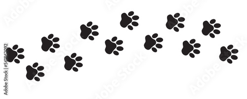 Footprints of pets, dogs or cats. Pet prints. Paw pattern. Paw print in the form of a black silhouette.