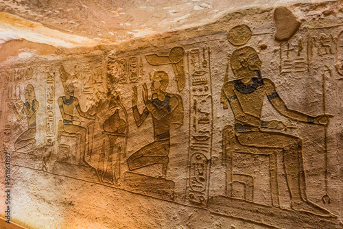 ABU SIMBEL, EGYPT - FEB 22, 2019: Wall carvings in the Great Temple of Ramesses II  in Abu Simbel, Egypt.