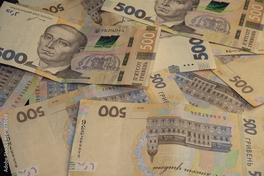 Fototapeta premium Ukrainian hryvnia, new 500 hryvnia banknotes. hryvnia devaluation. Close-up. Financial background. Hryvnia (UAH) 