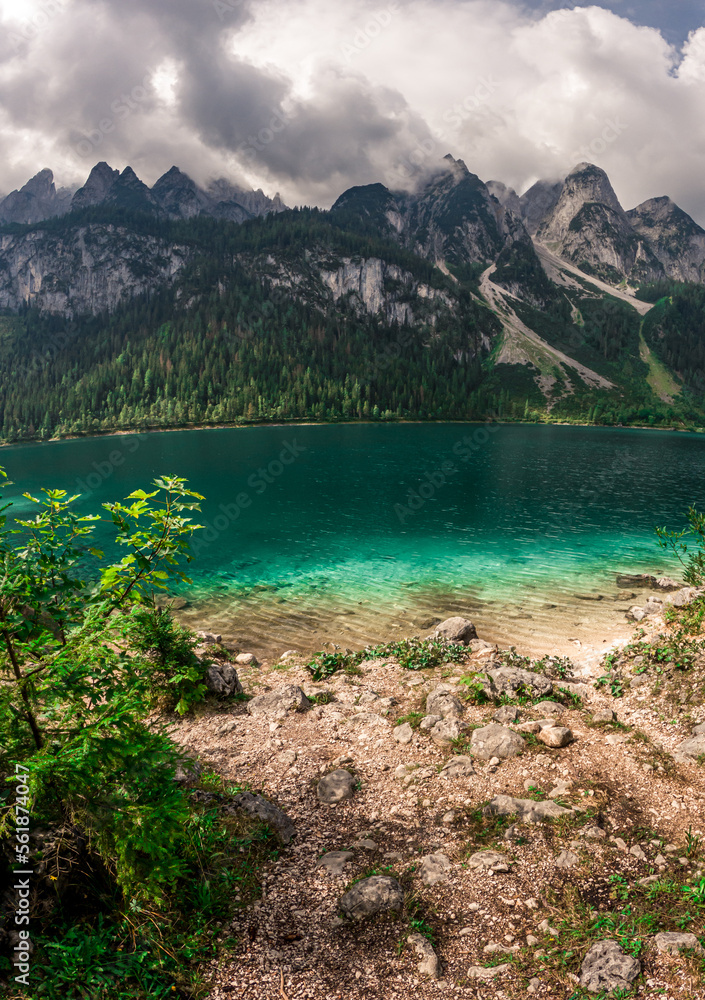 Obraz premium Austrian glacier water sea mountains lake landscape nature drone shot clouds sky green village alaska norway fjord blue forest 