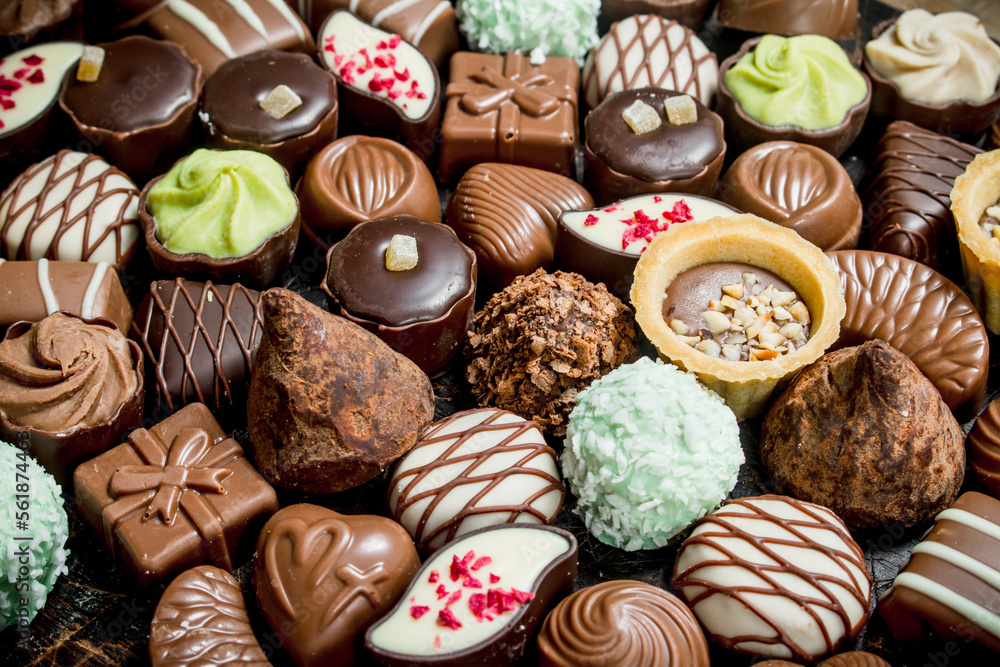 Chocolate candies with nuts and various fillings. Chocolate candies with nuts and various fillings.