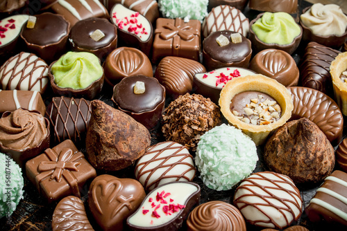 Chocolate candies with nuts and various fillings.