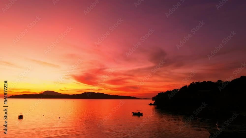 aerial view stunning red sky in the morning above Andaman sea ..scenic reflection of beautiful sunshine in the sea. .4k stock footage video in travel concept. bright sky background. aerial view stunning red sky in the morning above Andaman sea ..scenic reflection of beautiful sunshine in the sea. .4k stock footage video in travel concept. bright sky background.