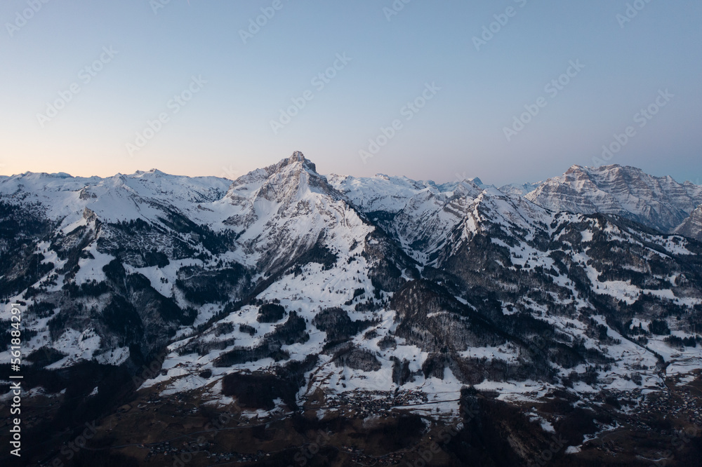 Amazing view of the snowy peaks in the Swiss Alps on a colorful morning.