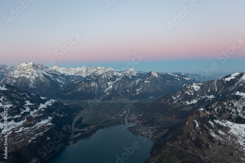 Amazing sunrise in canton Glarus in Switzerland at a mountain lake called Walensee.