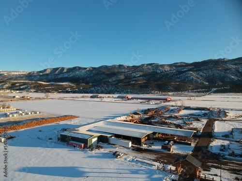 Aerial view of rural Utah city in the snow