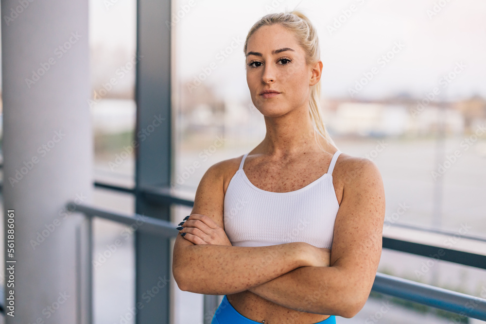 Portrait of a serious sportswoman looking at the camera Portrait of a serious sportswoman looking at the camera