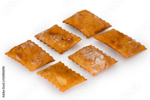 Angel wings, bugie (lies) or frappe or chiacchere or. Traditional italian carnival dessert isolated on white, clipping path photo