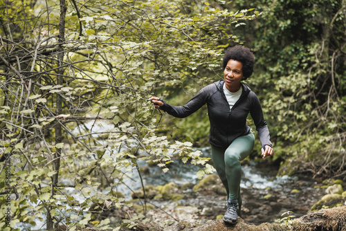 Black Woman Hiking On Mountain