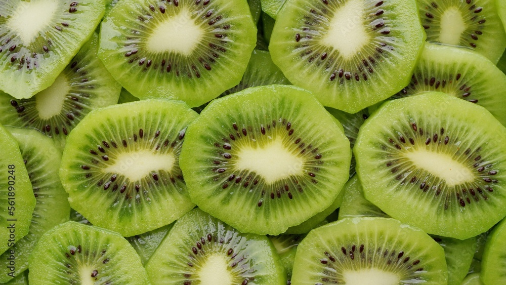 Sliced kiwi fruit top view. Fresh and healthy food concept Sliced kiwi fruit top view. Fresh and healthy food concept