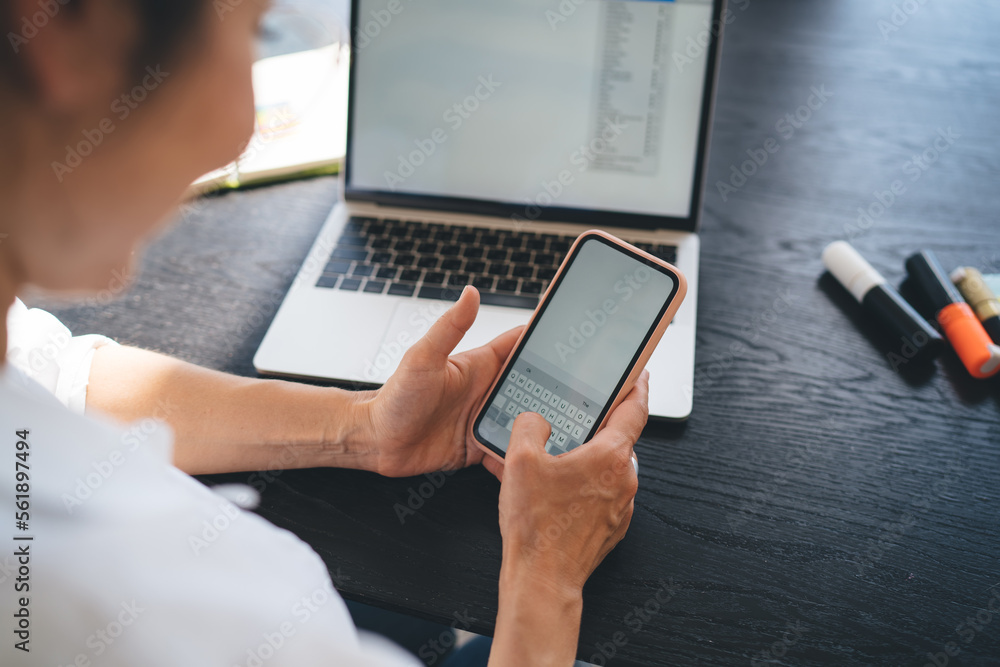 Woman browsing mobile with copy space while chatting Woman browsing mobile with copy space while chatting